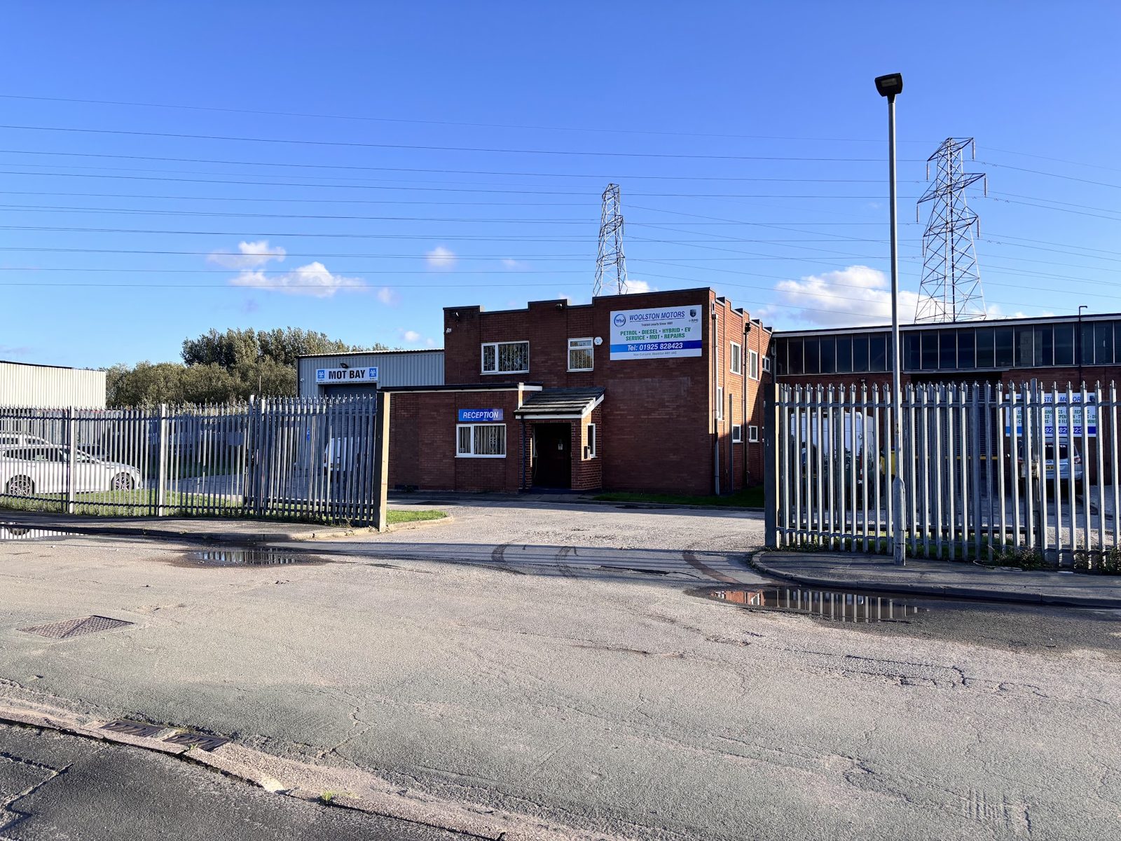 Woolston Motors on New Cut Lane on a sunny day